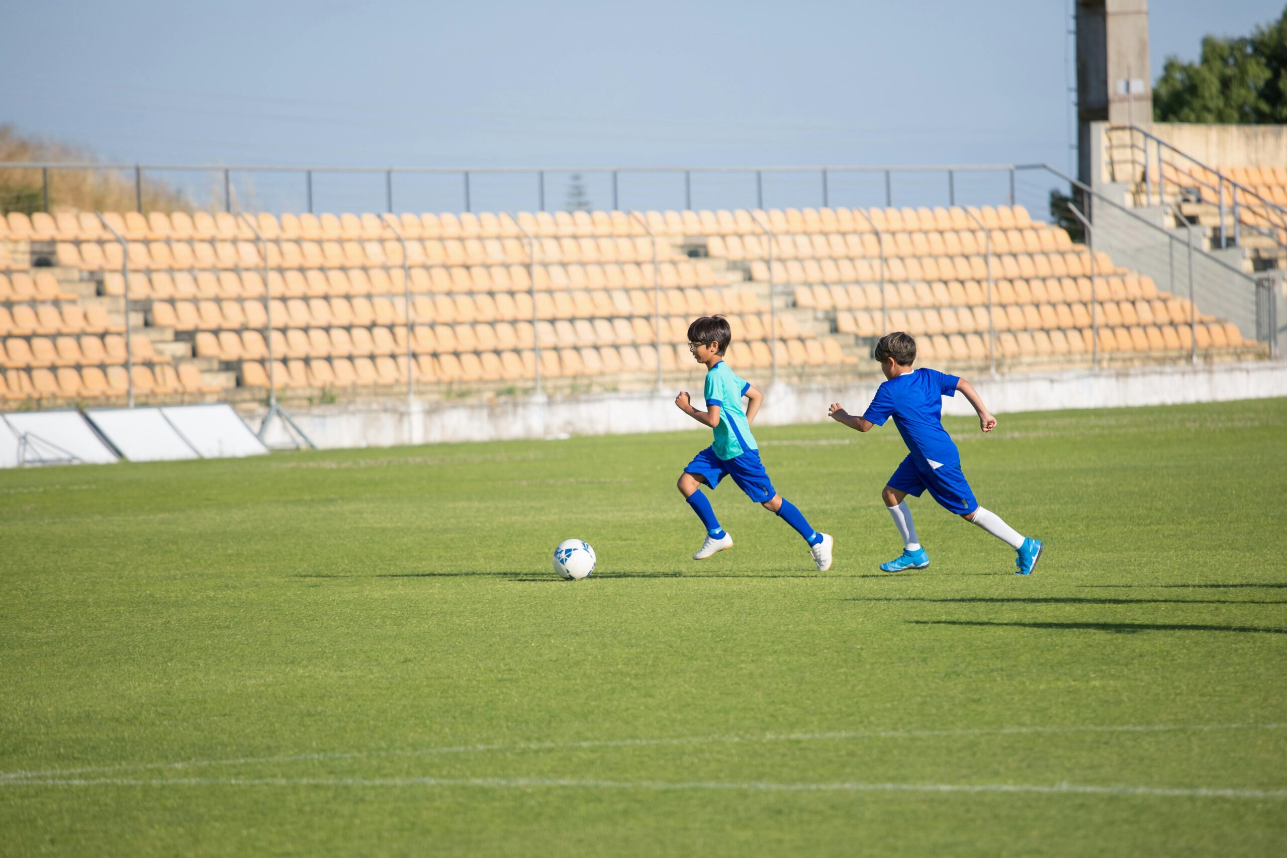 Two- young- boys playing- soccer-